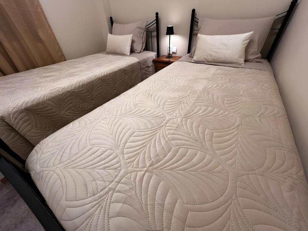 Ein Bett oder Betten in einem Zimmer der Unterkunft Adosado La Dolce Vita