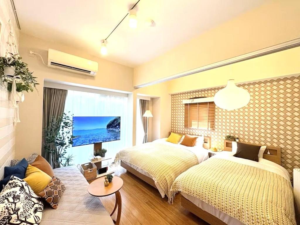 Katil atau katil-katil dalam bilik di simasima-stayサン203 高松駅徒歩5分