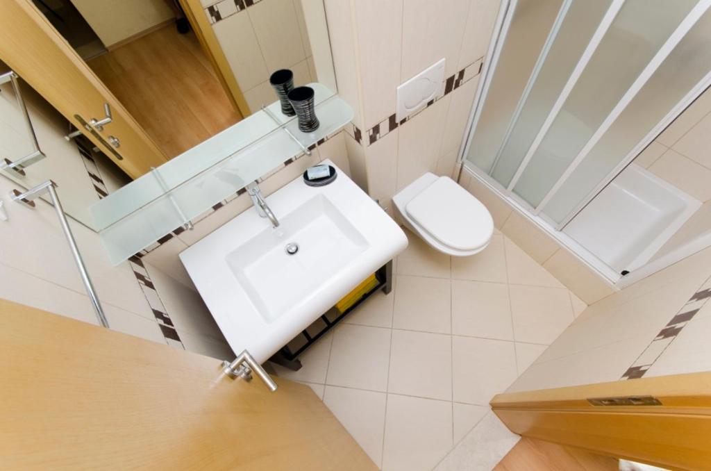 Kúpeľňa v ubytovaní Vidoš apartments