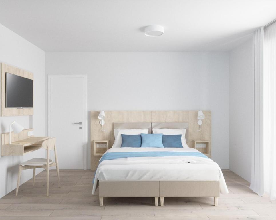 Postel nebo postele na pokoji v ubytování Fairschlafen Boutique Hostel Zimmer 0-02