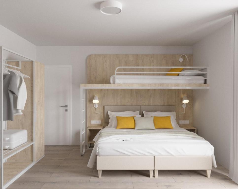 Postel nebo postele na pokoji v ubytování Fairschlafen Boutique Hostel Zimmer 1-05