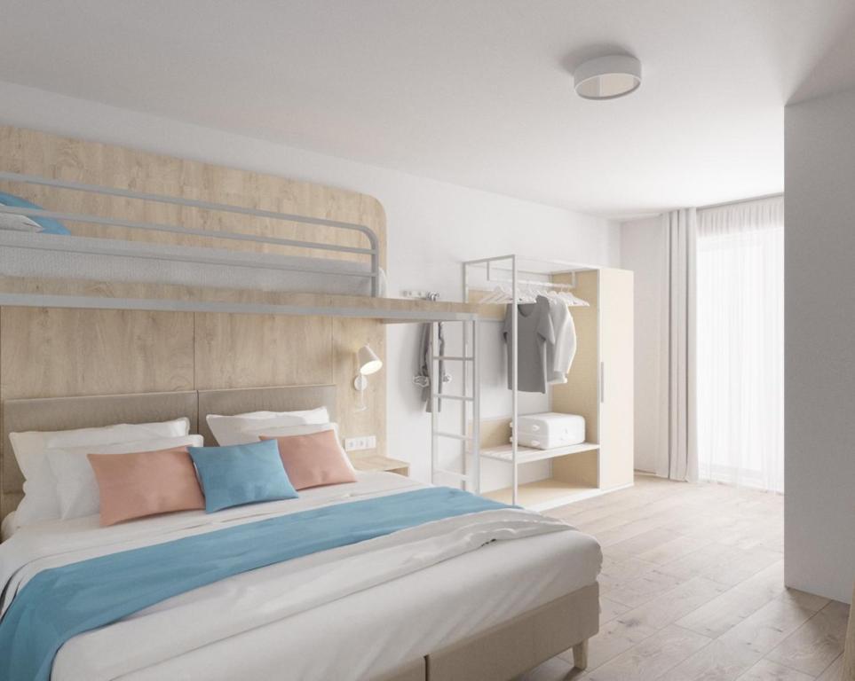 Ένα ή περισσότερα κρεβάτια σε δωμάτιο στο Fairschlafen Boutique Hostel Zimmer 0-08