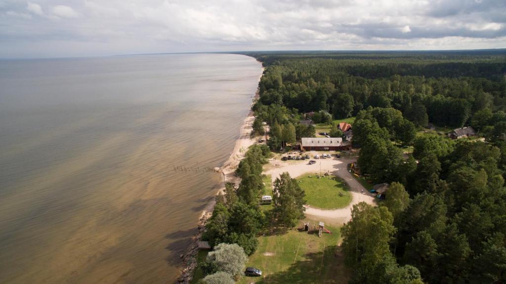 an aerial view of an island in the water at Viesu nams Melnsils in Melnsils