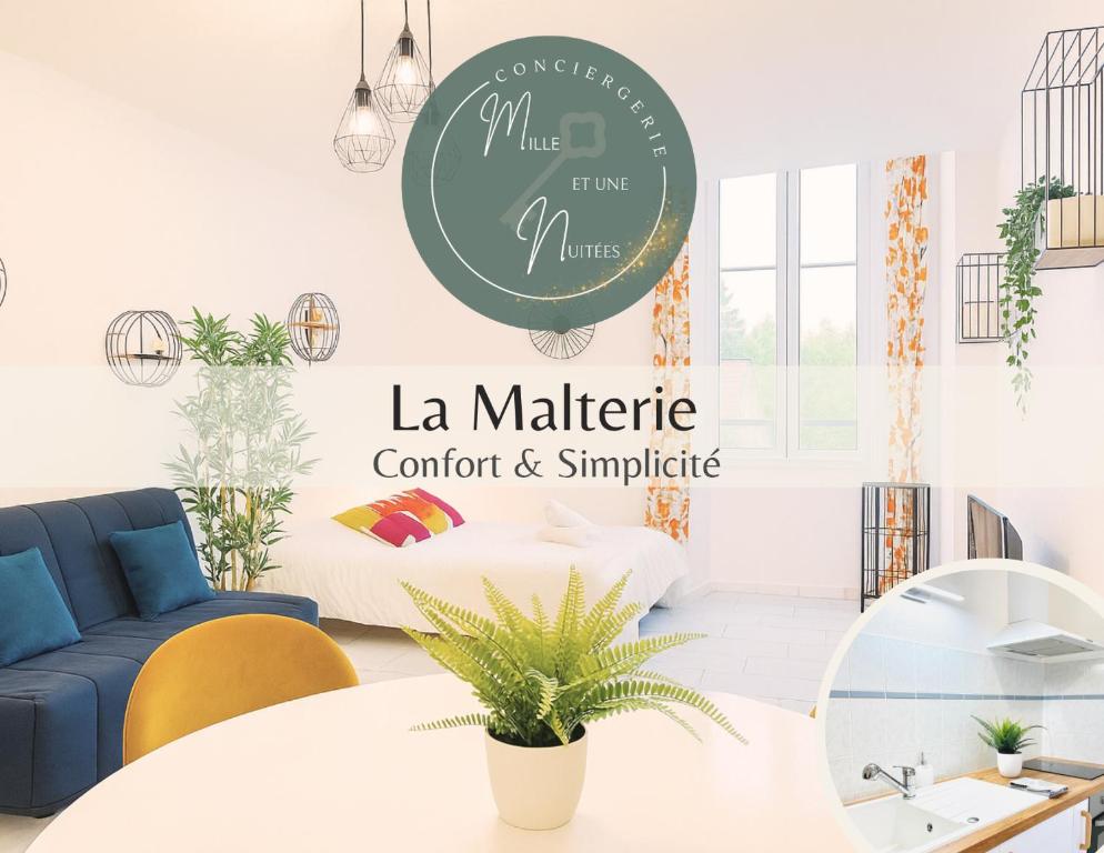 a living room with a round sign that reads la matisse comfort and simplified at La Malterie - Machine à laver & WiFi in La Chapelle-Saint-Luc