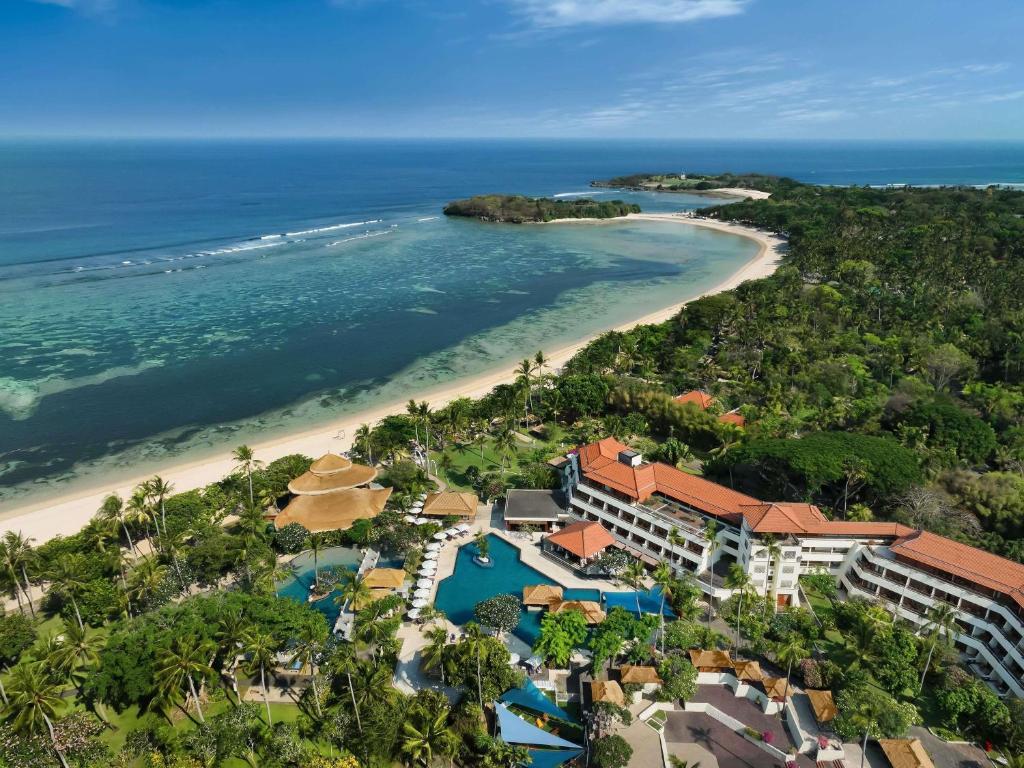 an aerial view of the resort and the beach at Nusa Dua Beach Hotel and Spa - Handwritten Collection in Nusa Dua