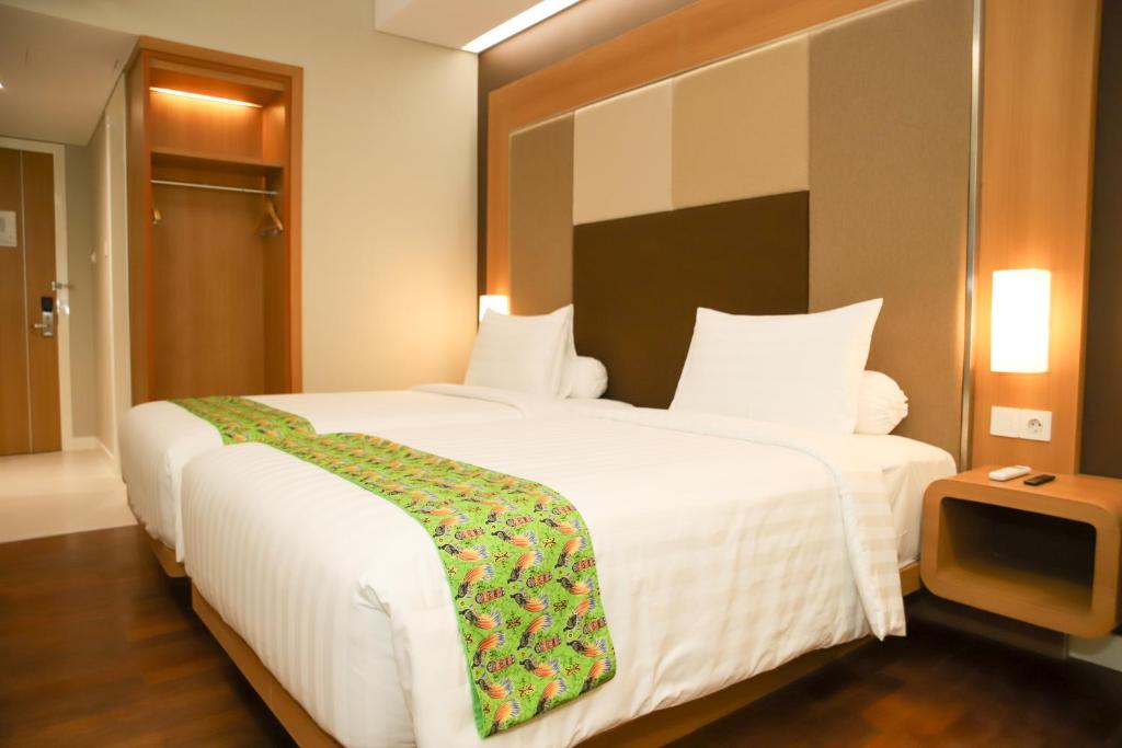 Front One Hotel Papua Lestari - Deluxe Tweepersoonskamer Met 2 Aparte Bedden