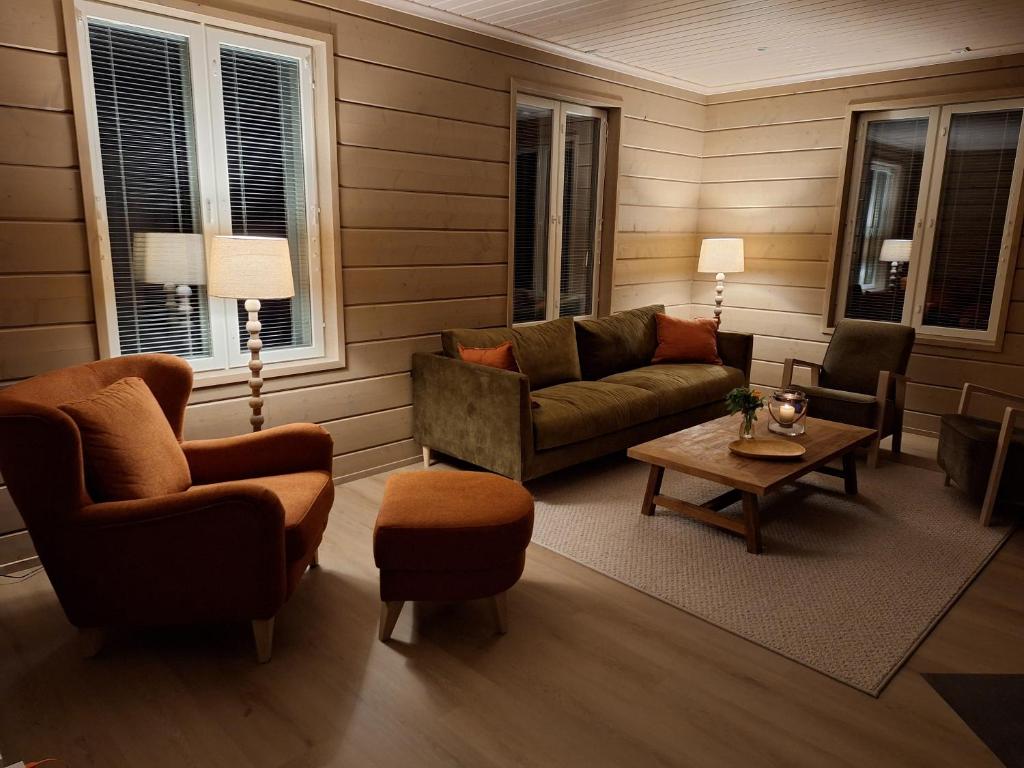 Posezení v ubytování Villa Aattu