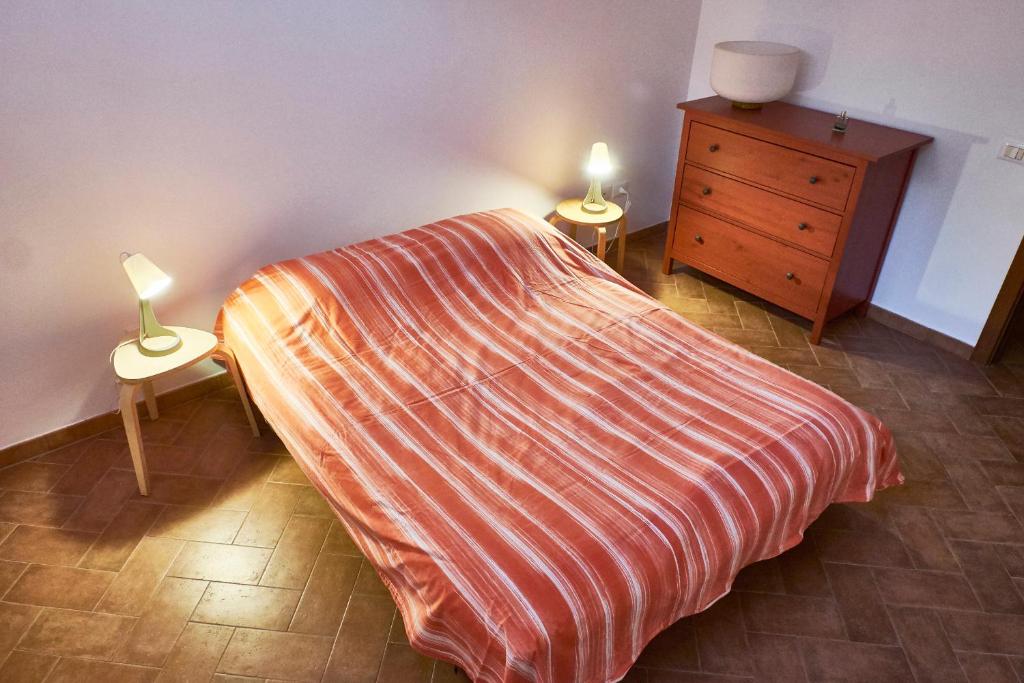 Postel nebo postele na pokoji v ubytování Yoga and sound 2