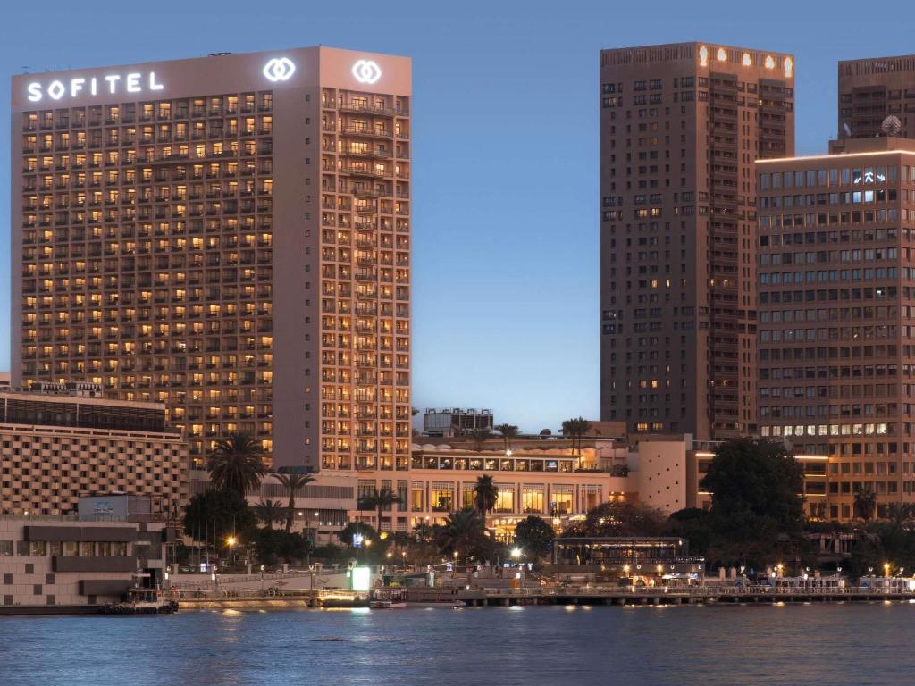 a view of a city with tall buildings at Sofitel Cairo Downtown Nile in Cairo
