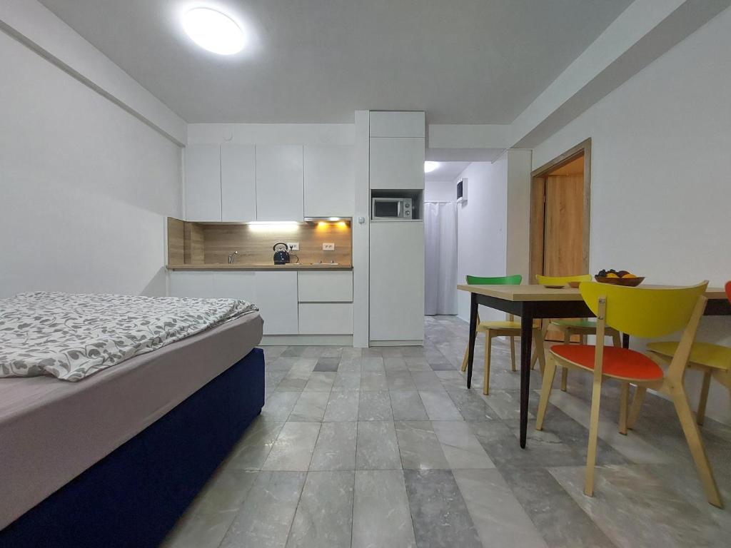 Kuchyň nebo kuchyňský kout v ubytování Apartment Sun