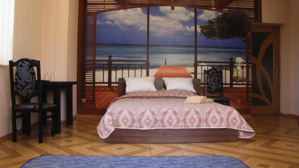 Postel nebo postele na pokoji v ubytování Mini Hotel Leon