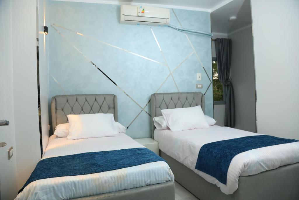 Ένα ή περισσότερα κρεβάτια σε δωμάτιο στο Crystala 2 Guest House