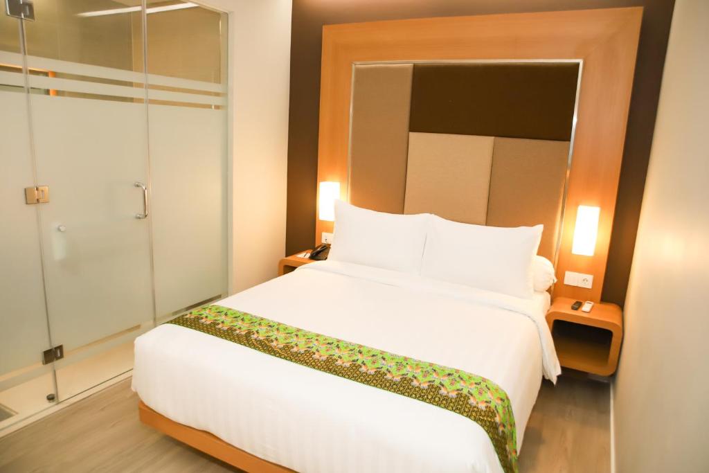 Front One Hotel Papua Lestari - Улучшенный номер - Без окна