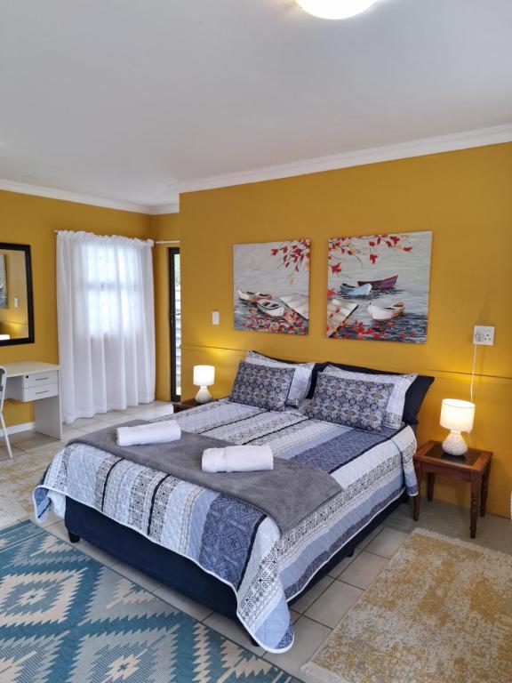 Postel nebo postele na pokoji v ubytování The Hilton Stay Cottages