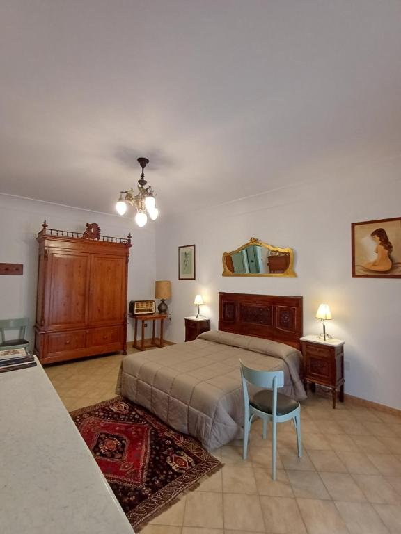 Postel nebo postele na pokoji v ubytování Antica dimora Dorotea centro Sicilia