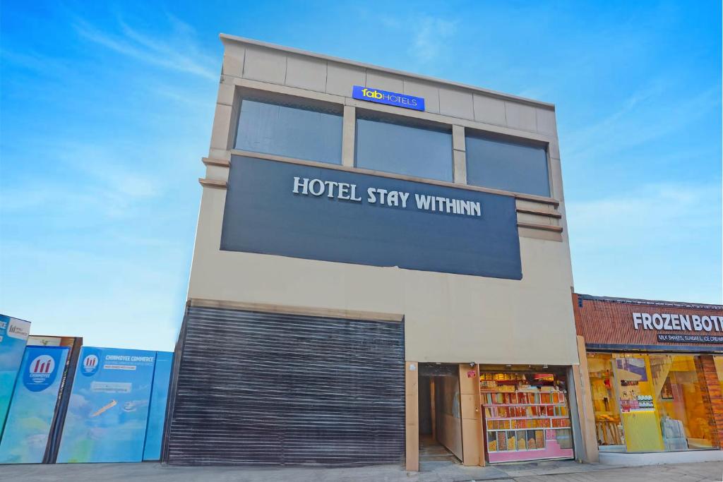 a hotelstay within sign on the side of a building at Via Together Stays in Rānchī