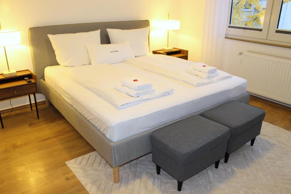 Postel nebo postele na pokoji v ubytování Wohnung im Zentrum von Paderborn für 4 Personen