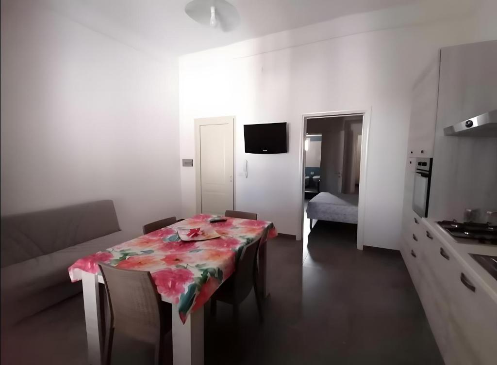 a room with a table with a table cloth on it at Casa Vacanze Lu Rizzaru in Nardò
