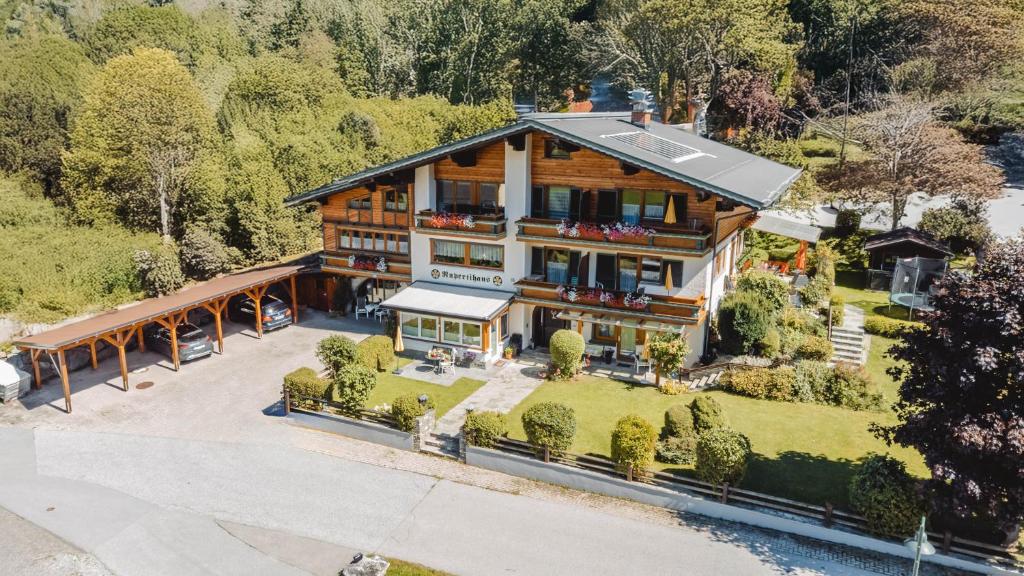 an aerial view of a house with a yard at Ferienwohnungen Rupertihaus in Flachau