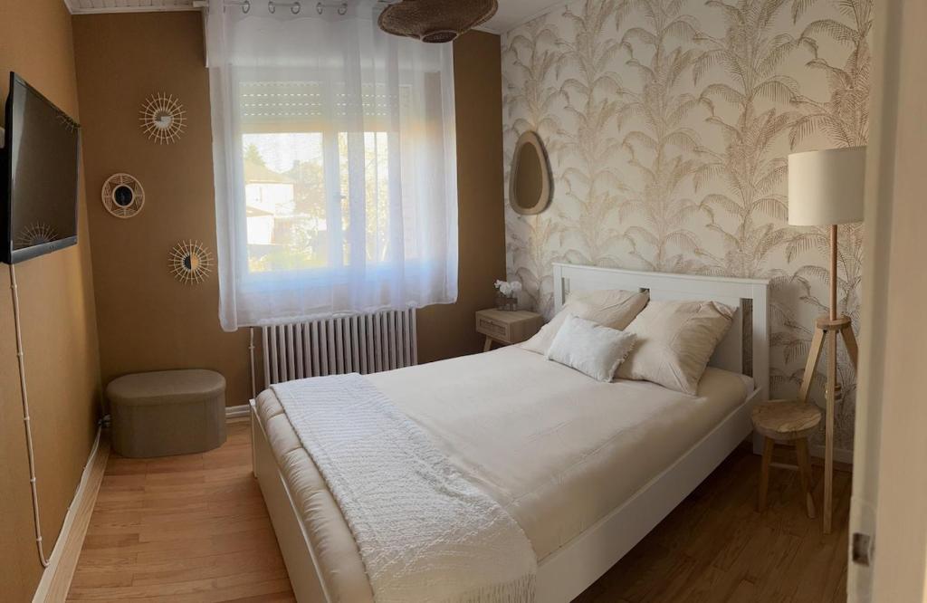 Postel nebo postele na pokoji v ubytování Maison 3 chambres à Lambres Lez Douai