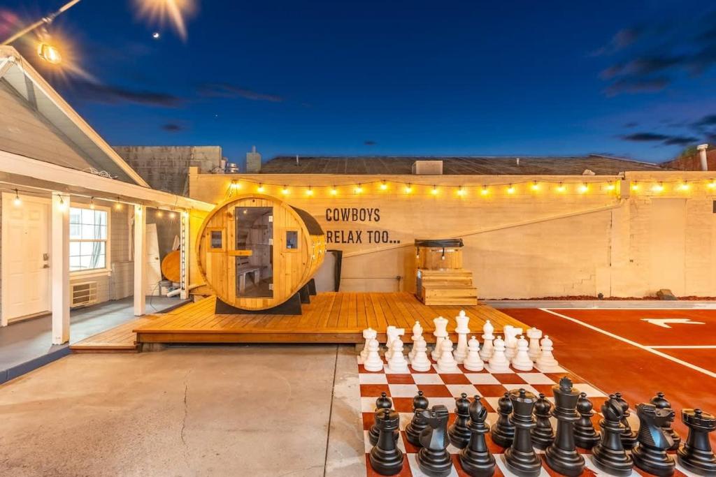 a gym with a tennis court and a chess board at The Cowboy Social Unit 12 in Williams