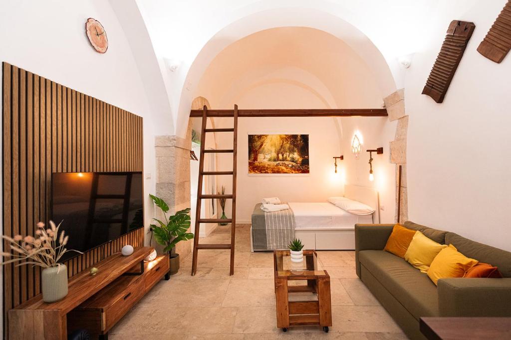 Postel nebo postele na pokoji v ubytování Carpe Diem - Dimora Rustica