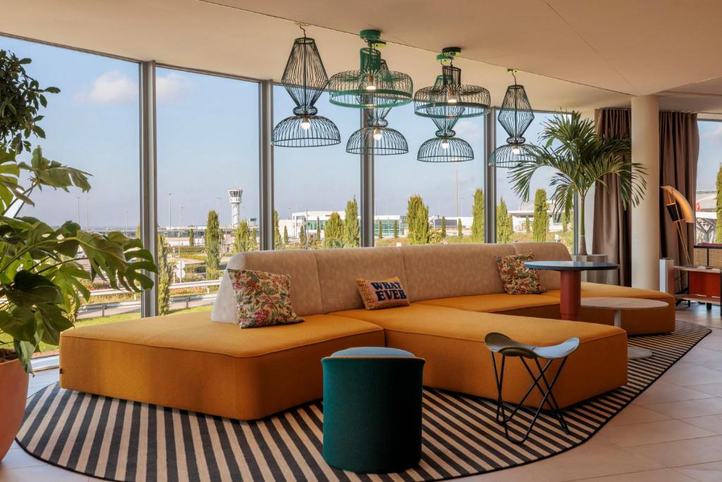 Posezení v ubytování Hampton By Hilton Lyon Airport