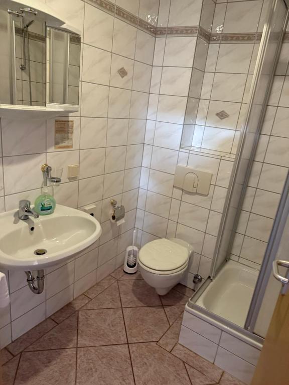 Koupelna v ubytování Hotel Leonis