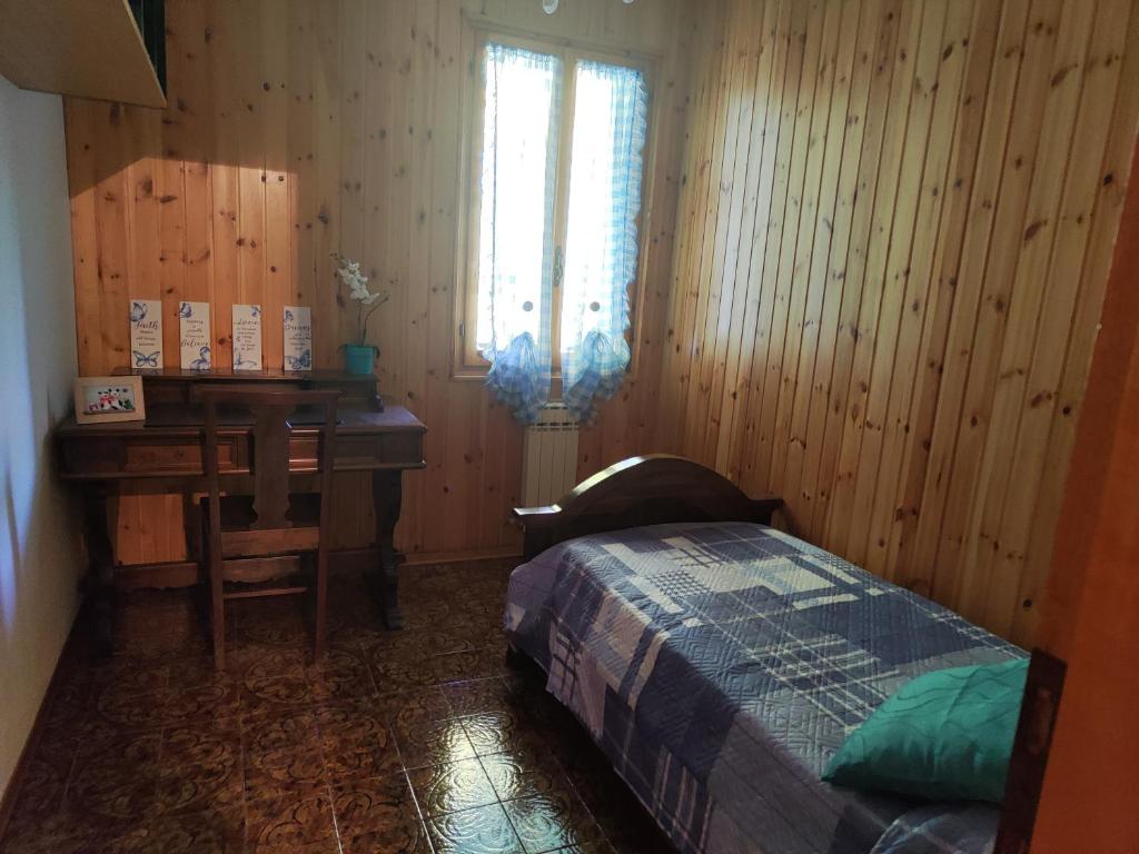 En eller flere senge i et værelse på La casa della Lavanda