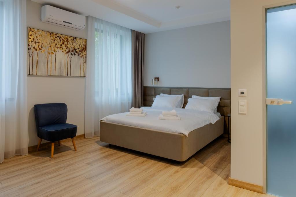 Postel nebo postele na pokoji v ubytování d'or Hotel