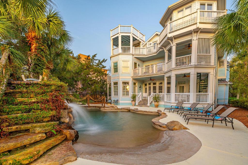 a large house with a swimming pool in the yard at 4205 Ninth Street in Saint Simons Island