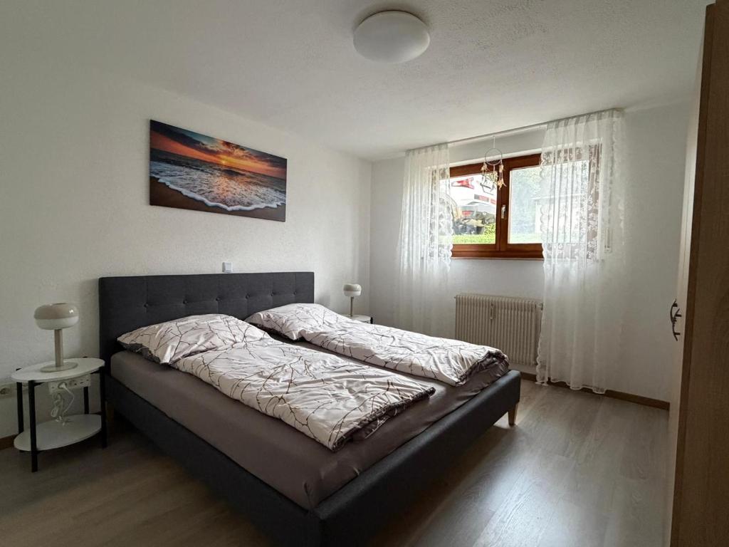 Postel nebo postele na pokoji v ubytování Apartment HESS