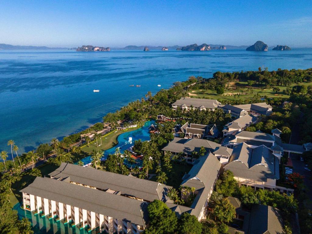 an aerial view of a resort on the water at Sofitel Krabi Phokeethra Golf and Spa Resort in Klong Muang Beach