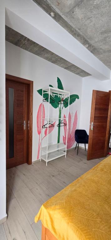 Postel nebo postele na pokoji v ubytování The Pink Banana