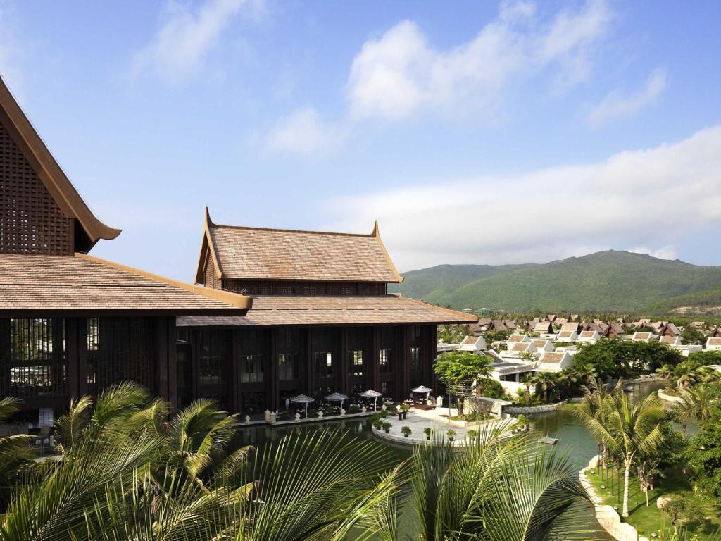 a view of the resort from the garden at Pullman Sanya Yalong Bay Villas & Resort in Sanya