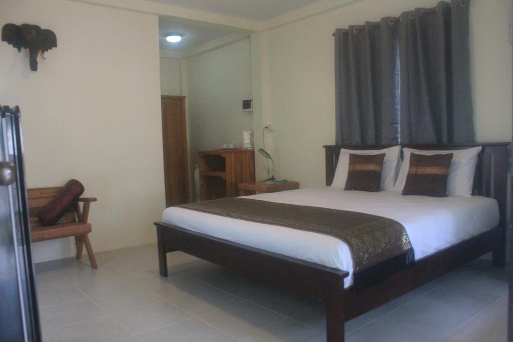 Postel nebo postele na pokoji v ubytování Privacy Resort - Koh Chang