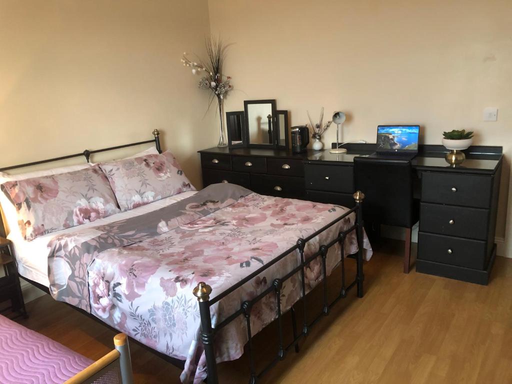 Postel nebo postele na pokoji v ubytování Sunset Room