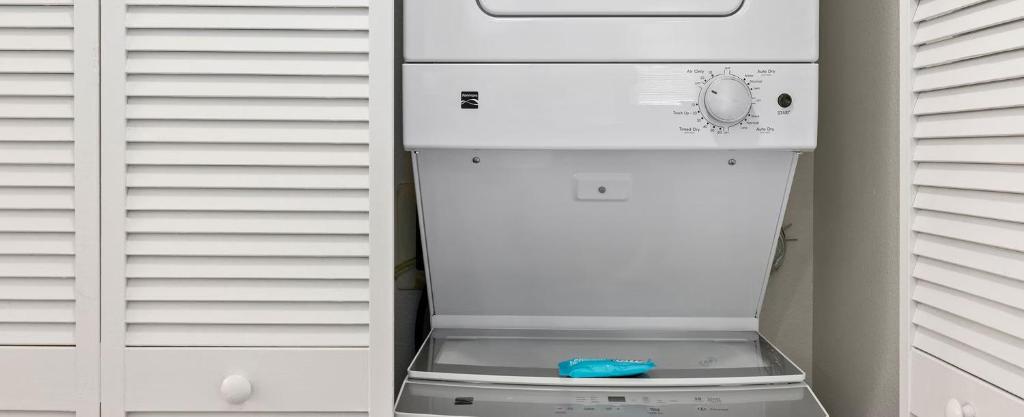 a white refrigerator with its door open in a kitchen at Worldmark Tropicana Avenue in Las Vegas