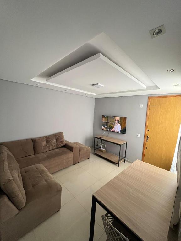 Televisyen dan/atau pusat hiburan di Complete apartment with Wi-Fi and equipped kitchen