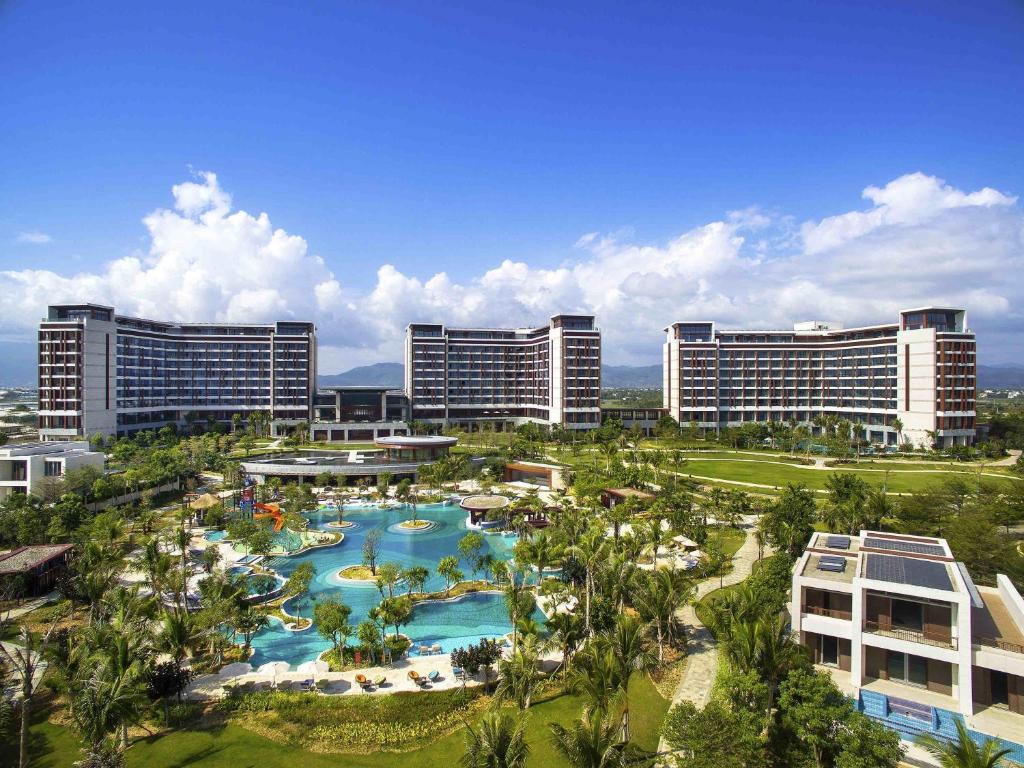 an aerial view of a resort with a swimming pool at Sofitel Sanya Leeman Resort in Sanya