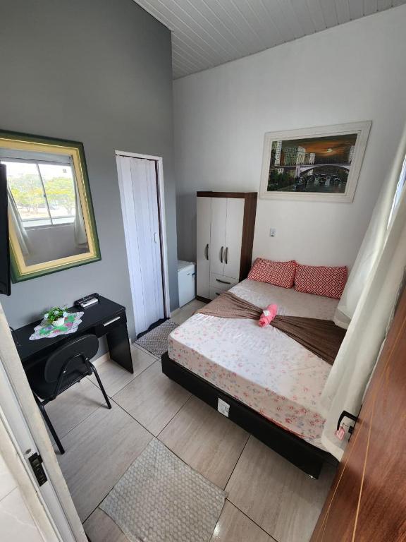Ένα ή περισσότερα κρεβάτια σε δωμάτιο στο JM Hotel