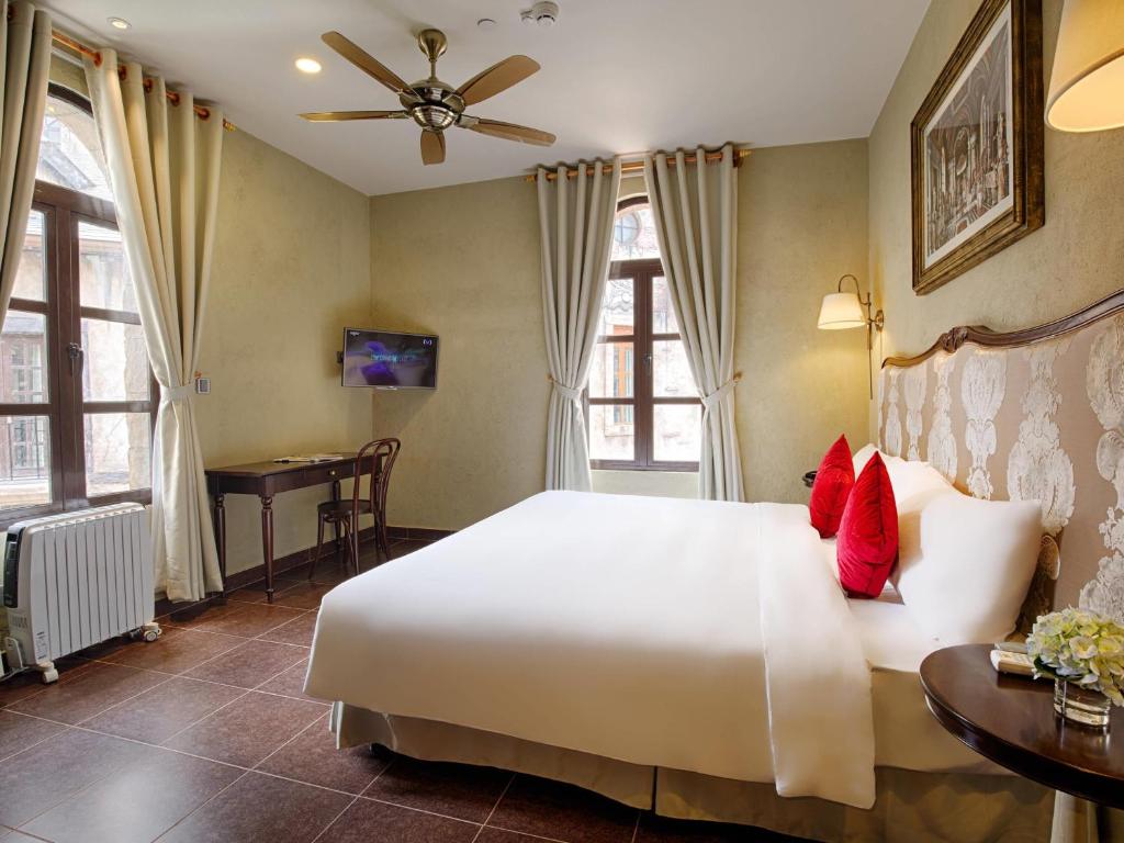 Family Deluxe Room with One King Bed and One Single Bed