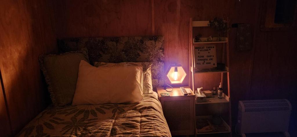 Ένα ή περισσότερα κρεβάτια σε δωμάτιο στο Minimalist Cabin Solo Traveller