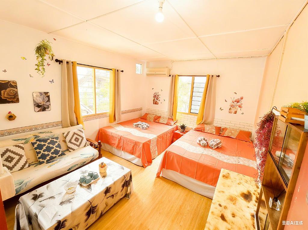 Ένα ή περισσότερα κρεβάτια σε δωμάτιο στο 玖月舒苑