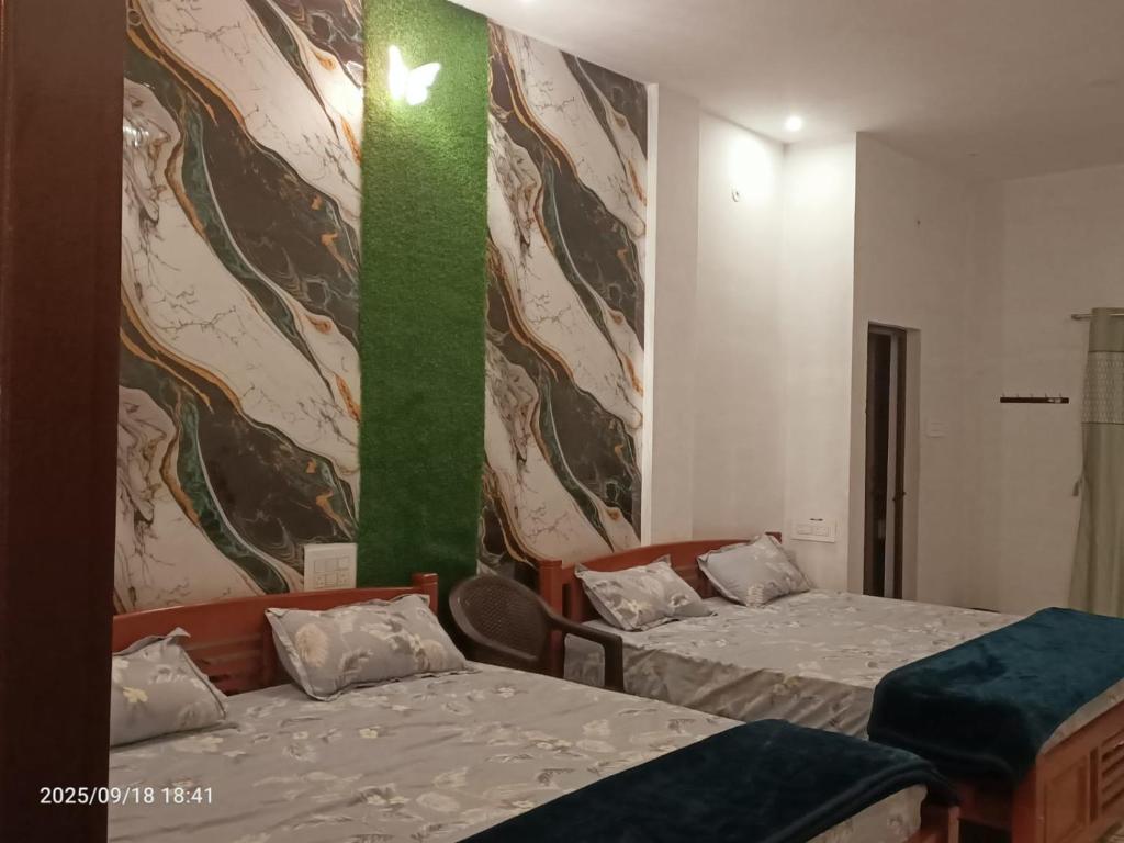 Ένα ή περισσότερα κρεβάτια σε δωμάτιο στο Wildlife Homestay