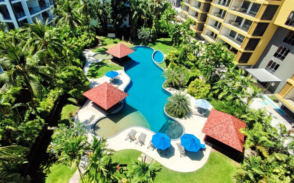 an aerial view of the pool at the resort at Casuarina Shores Apartment - SHA Plus in Bang Tao Beach