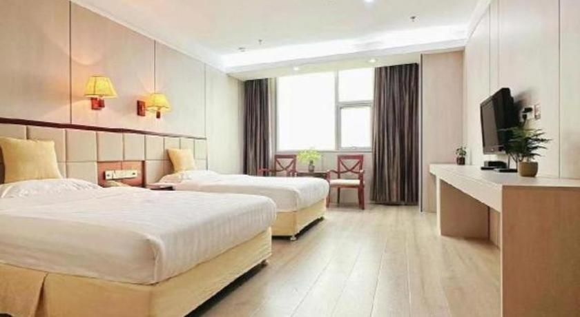 Postel nebo postele na pokoji v ubytování Bashan Hotel