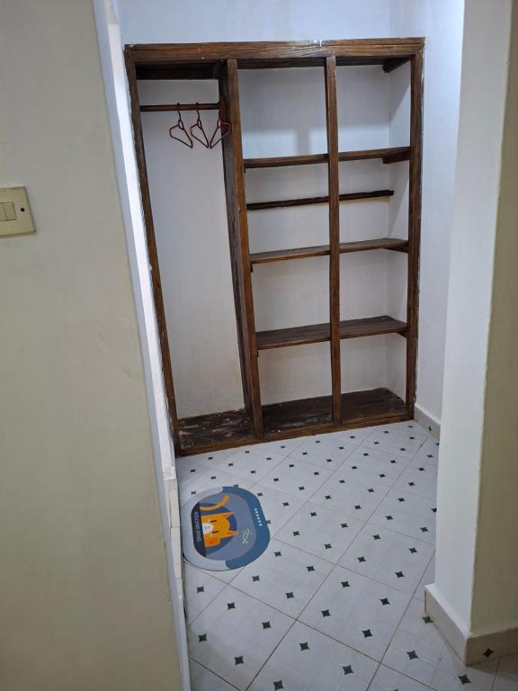 Ένα ή περισσότερα κρεβάτια σε δωμάτιο στο Guguski Homes