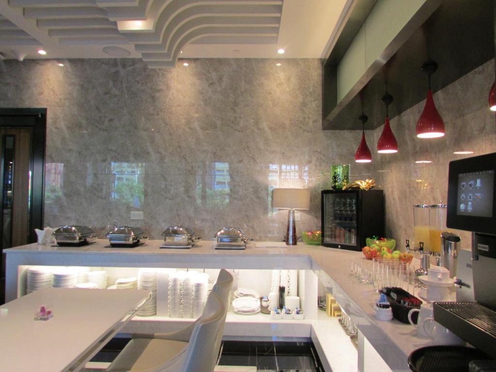 Кухня или мини-кухня в Mercure Singapore Bugis
