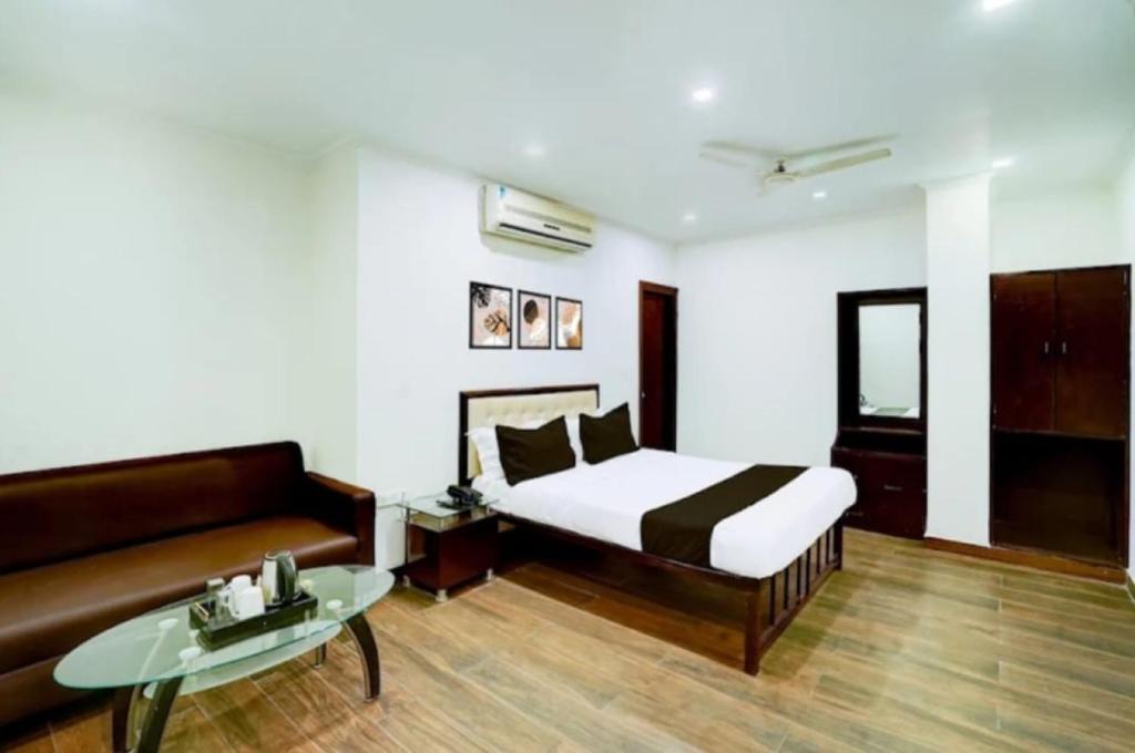 Ένα ή περισσότερα κρεβάτια σε δωμάτιο στο Hotel Srida Jaipur